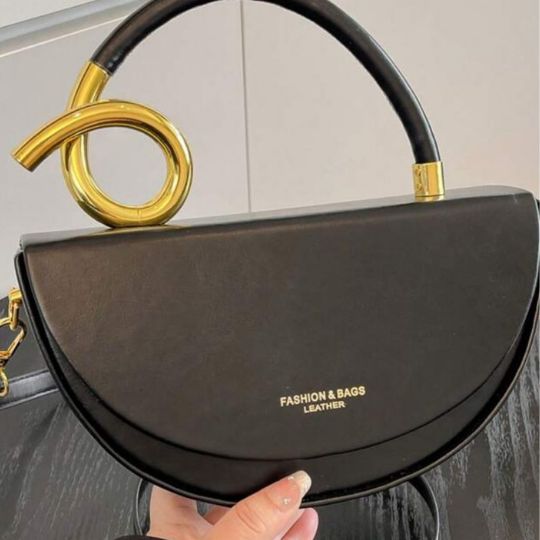 Notch Clutch Bag