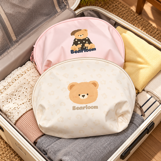 Travel Innerwear Bear Print Bag pink and cream designs in an open suitcase
